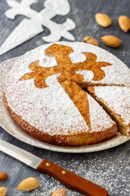  Tarta de Santiago:  A Delectable Almond Cake Whispering Tales of Spain's Rich Past and Tempting with Sweet Simplicity!